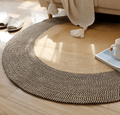 Round jute rug with a wide black border