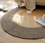 Round jute rug with a wide black border