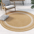 Round jute rug with two white rings under an armchair