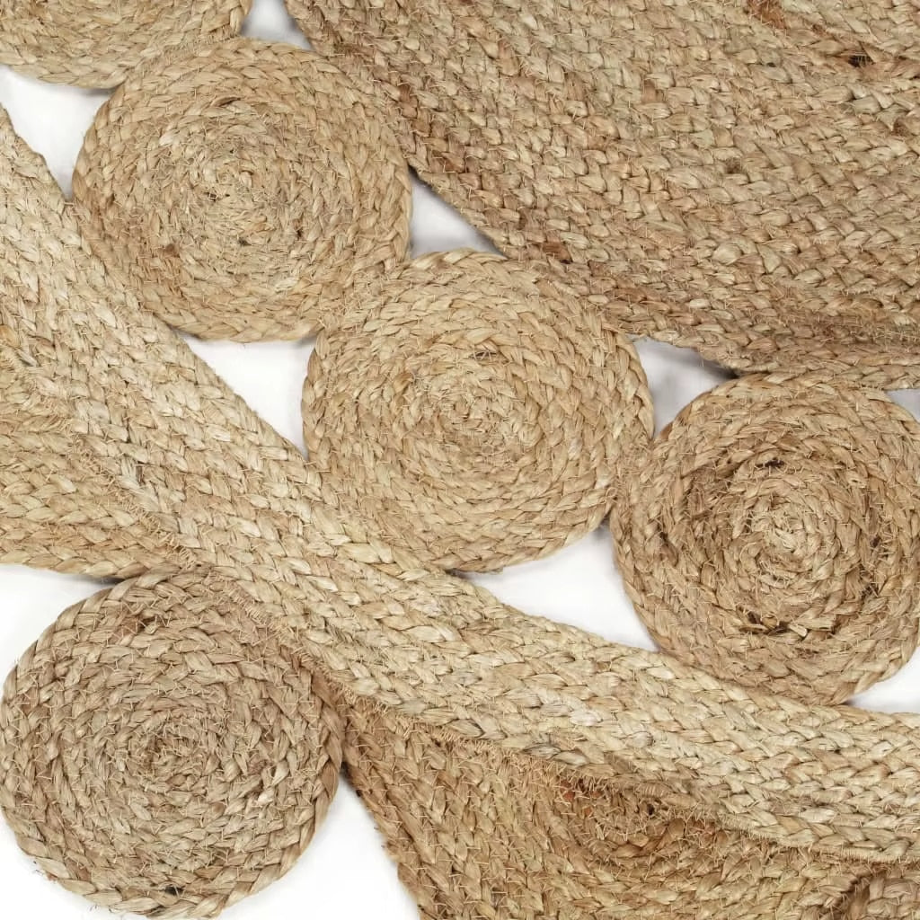 Round jute rug shaped like a sun with pointed rays