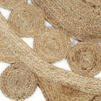 Round jute rug shaped like a sun with pointed rays