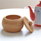 Round rattan storage basket with knob lid