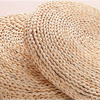 Round cushion tightly hand woven in light natural rattan