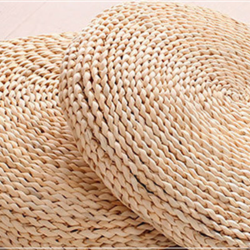 Round cushion tightly hand woven in light natural rattan