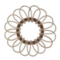A daisy like crown of rattan loops.
