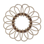 A daisy like crown of rattan loops.