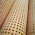 Roll of natural rattan cane webbing with a round open mesh