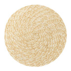 Round sand toned woven linen placemat with a straw look and non slip back
