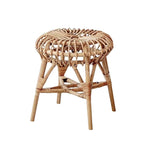 Round hand woven wicker stool with slim legs in a Scandinavian style