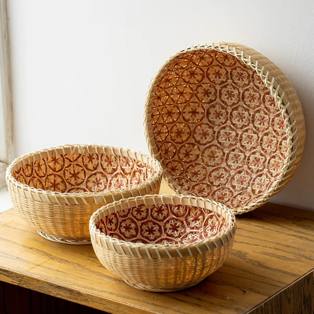 Round rattan bowl basket with orange patterned interior