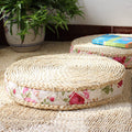 Round hand woven light rattan cushion with a rose fabric border