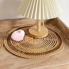 Round handwoven rattan decorative tray in natural beige