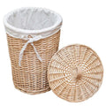 Round rattan laundry hamper with cotton liner and woven lid