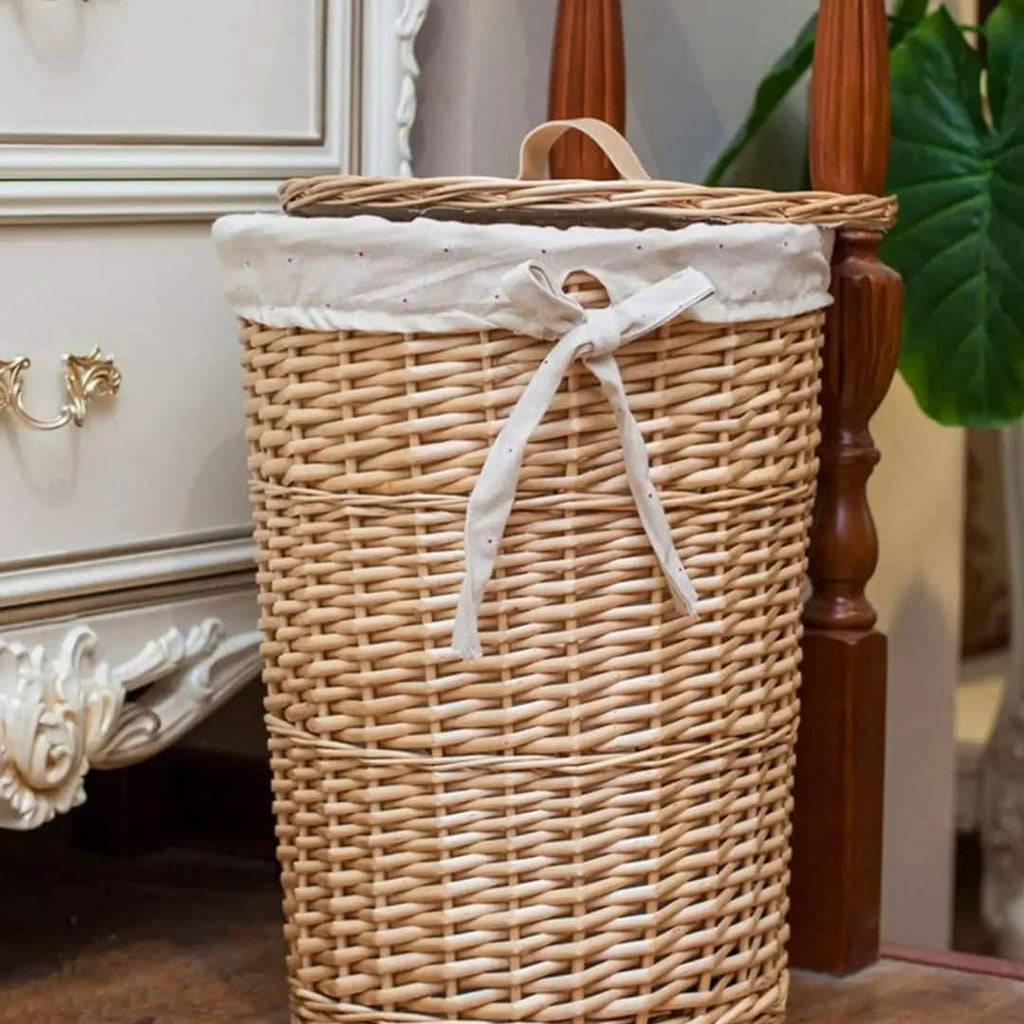 Round rattan laundry hamper with cotton liner and woven lid