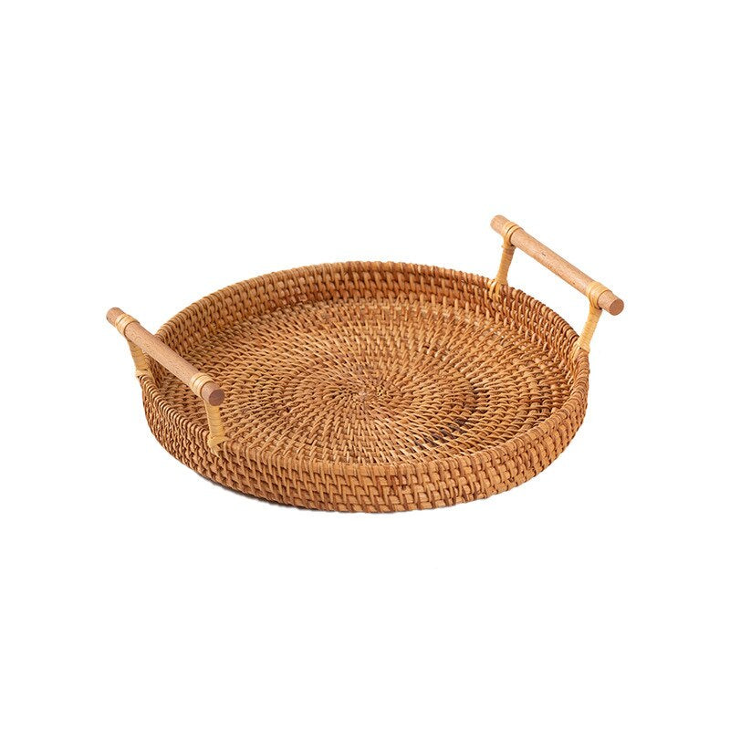 Round rattan serving tray with solid wooden handles