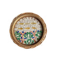 Round rattan tray with yellow and green fish motif