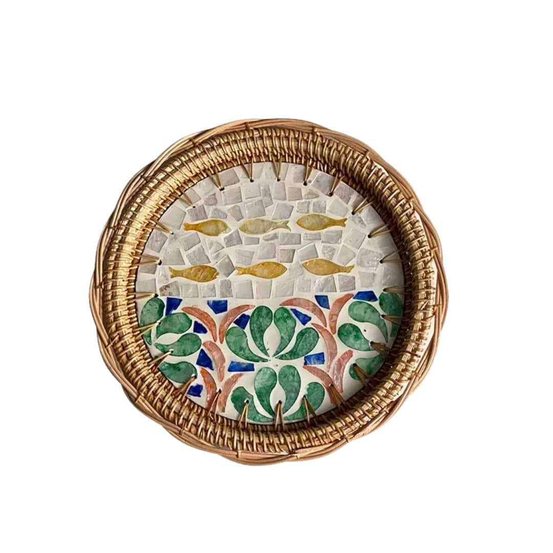 Round rattan tray with yellow and green fish motif