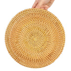 Round handwoven rattan tray with an arched center handle