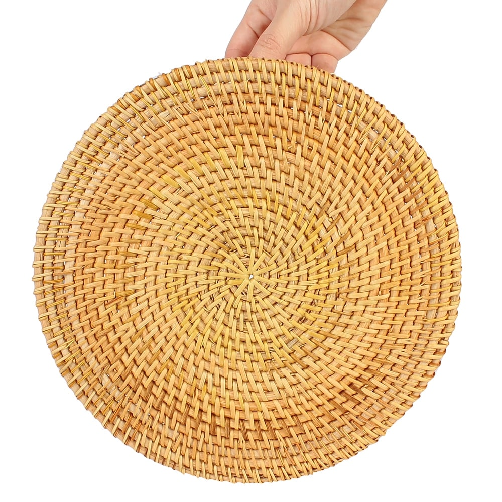 Round handwoven rattan tray with an arched center handle