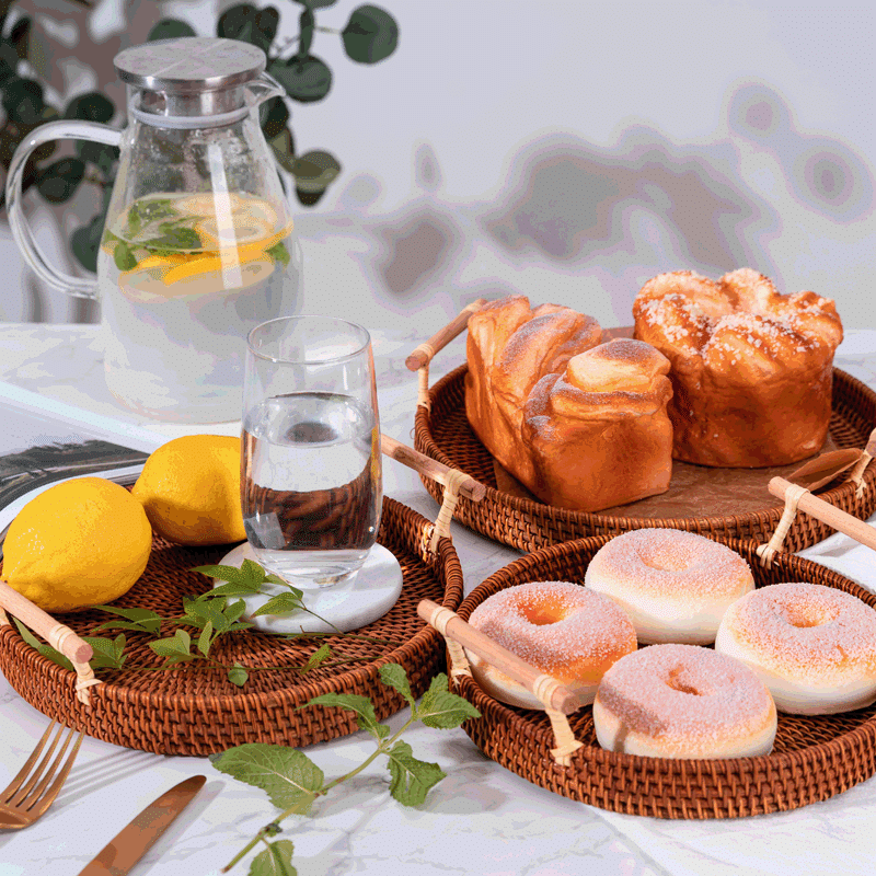 Round handwoven rattan tray with two side handles