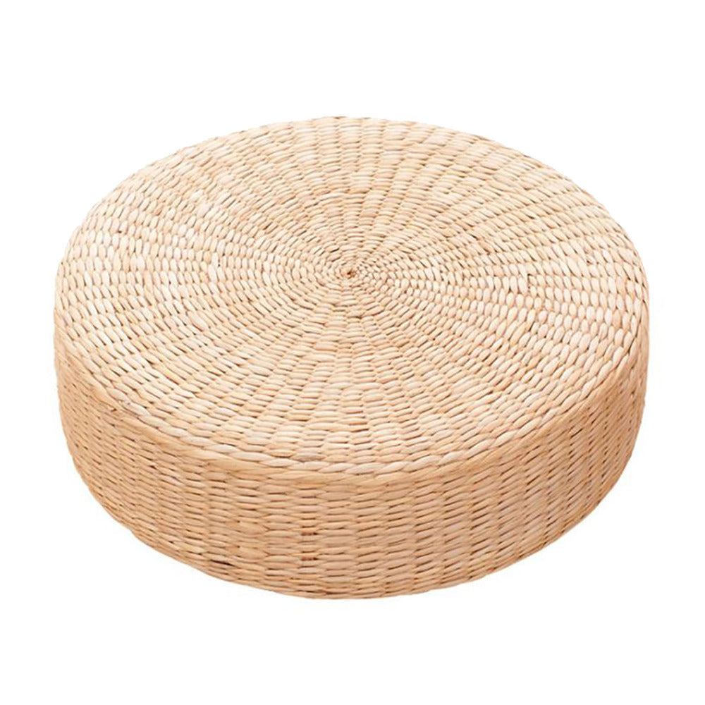 Round low rattan floor pouf hand woven in a spiral