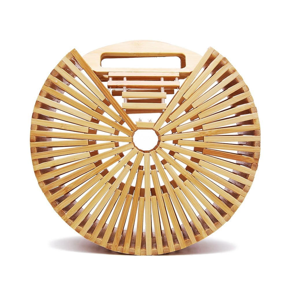 Round handbag pairing smooth sanded wood with a hand woven rattan body