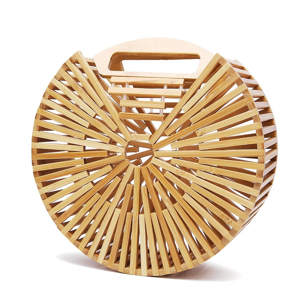Round handbag pairing smooth sanded wood with a hand woven rattan body