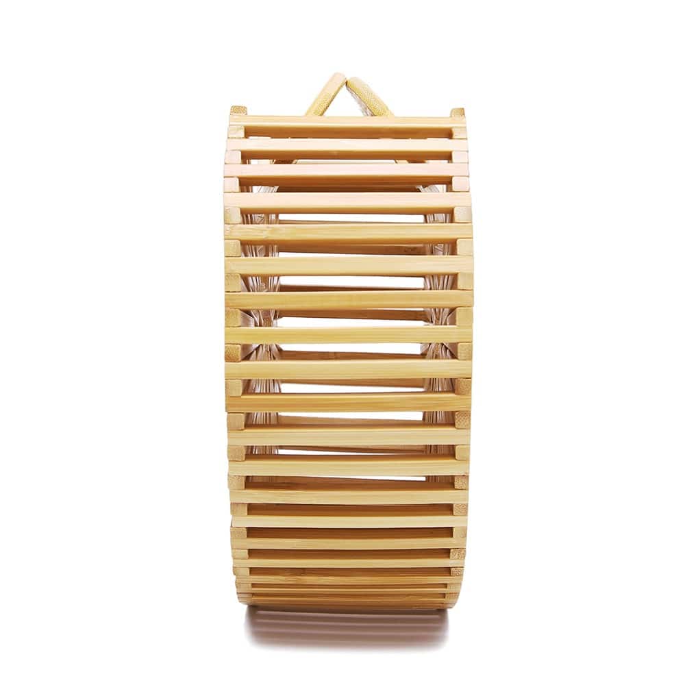 Round handbag pairing smooth sanded wood with a hand woven rattan body