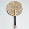 Round woven hand fan with wrapped handle in natural, blue or pink rings