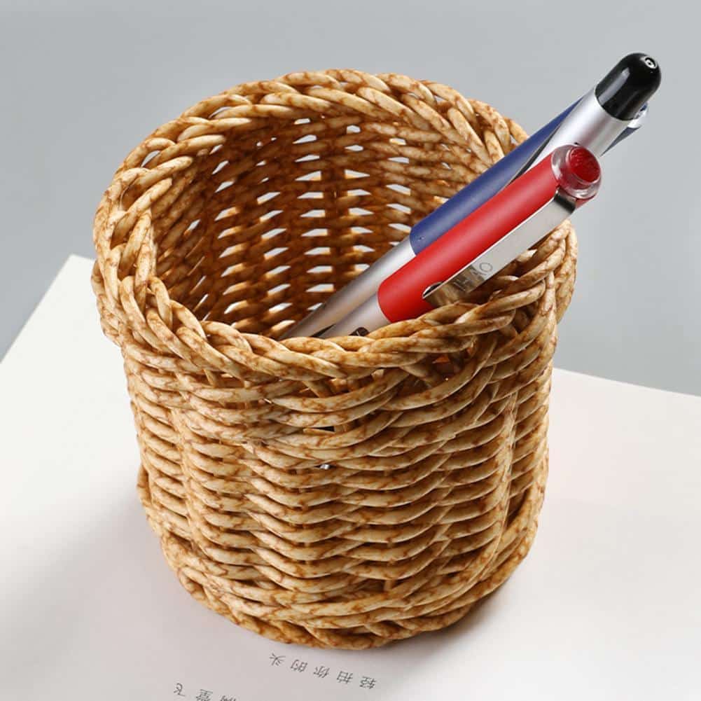 Small round woven cup holding tubes and toiletries