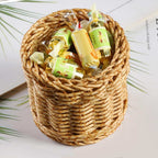 Small round woven cup holding tubes and toiletries