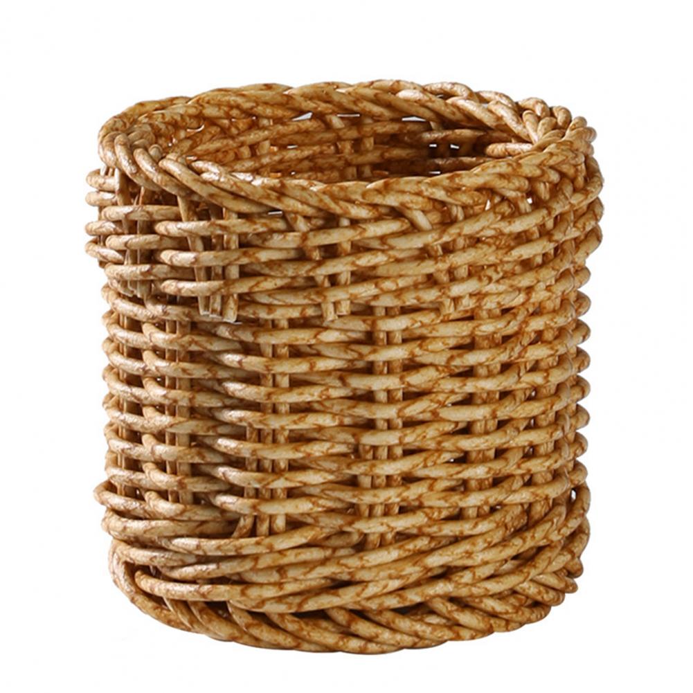Small round woven cup holding tubes and toiletries