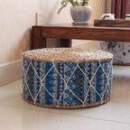 Round hand woven rattan pouf with blue tone patterns