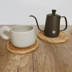 Round hand woven natural rattan coaster with a center opening