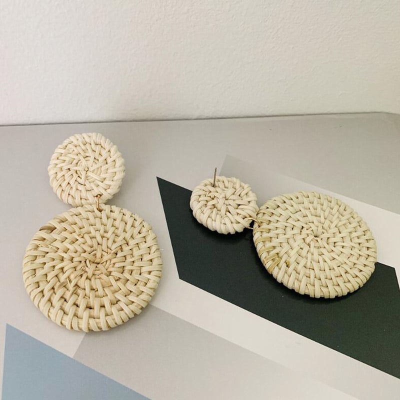 Pair of drop earrings made of two stacked round woven rattan discs