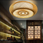 Wide round openwork pendant light hand woven in natural rattan