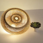 Wide round openwork pendant light hand woven in natural rattan
