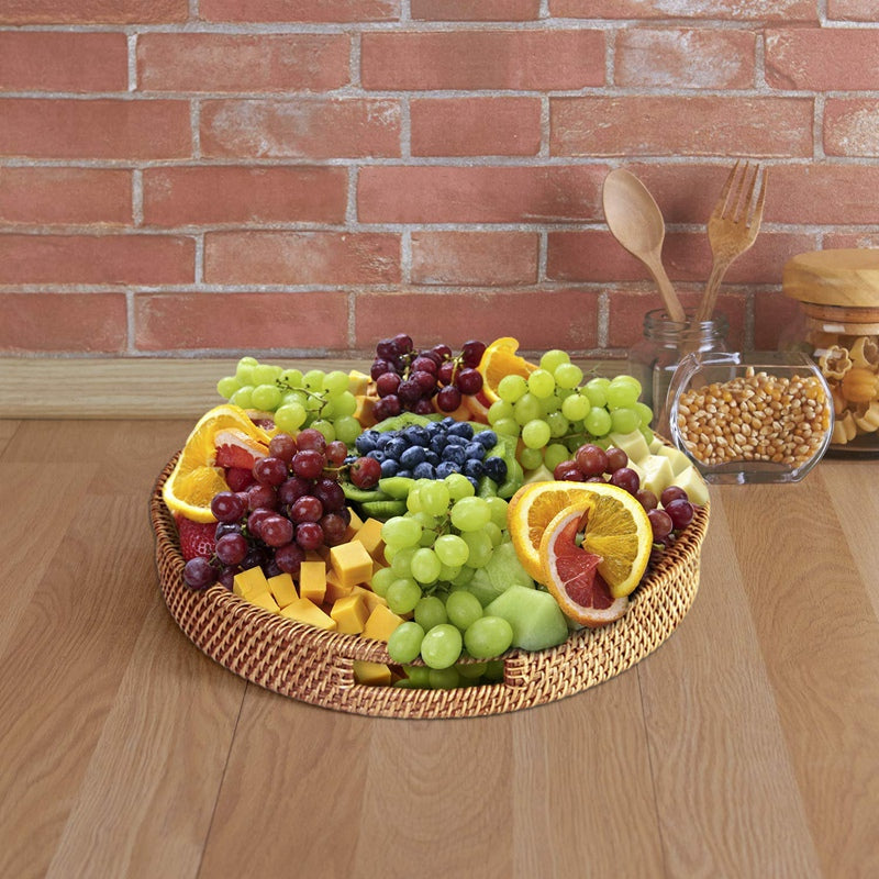 Round woven rattan serving tray with cut out handles