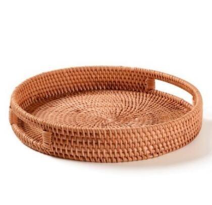 Round woven rattan serving tray with cut out handles