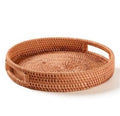 Round woven rattan serving tray with cut out handles