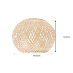 Rounded lamp shade hand woven in natural rattan with an airy mesh