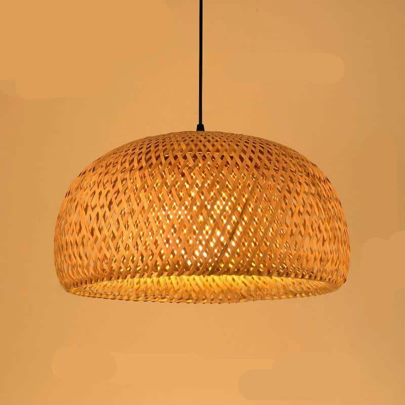 Rustic round pendant light hand woven in natural rattan