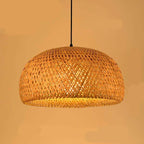 Rustic round pendant light hand woven in natural rattan
