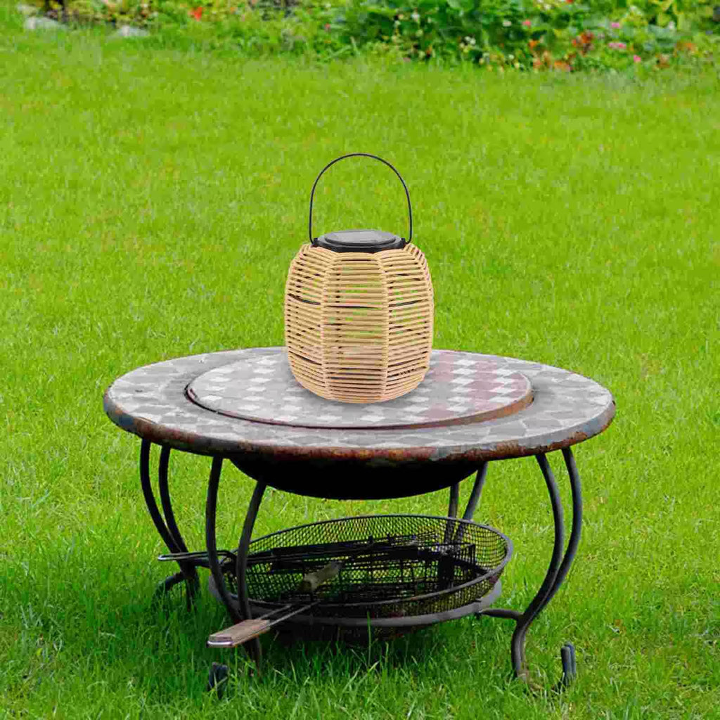 Rustic solar lantern with an iron frame and beige woven rattan panels