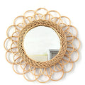 Scalloped rattan petals around a woven ring.