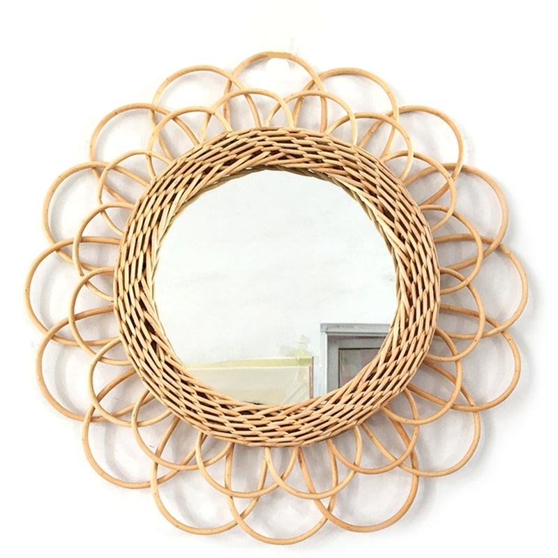 Scalloped rattan petals around a woven ring.