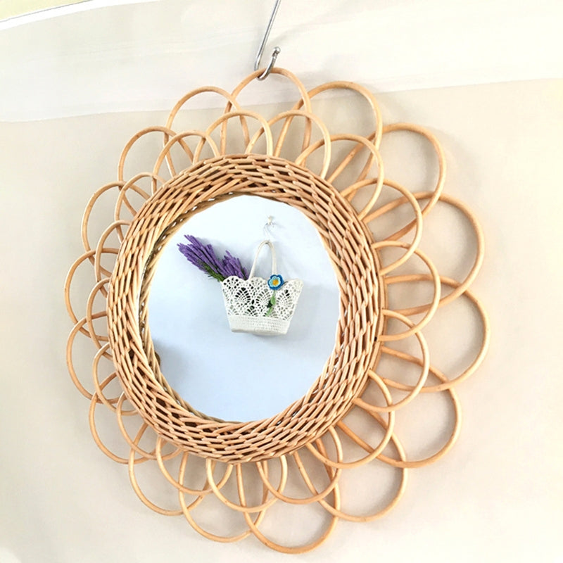Scalloped rattan petals around a woven ring.