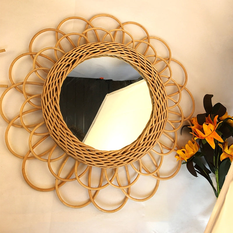 Scalloped rattan petals around a woven ring.