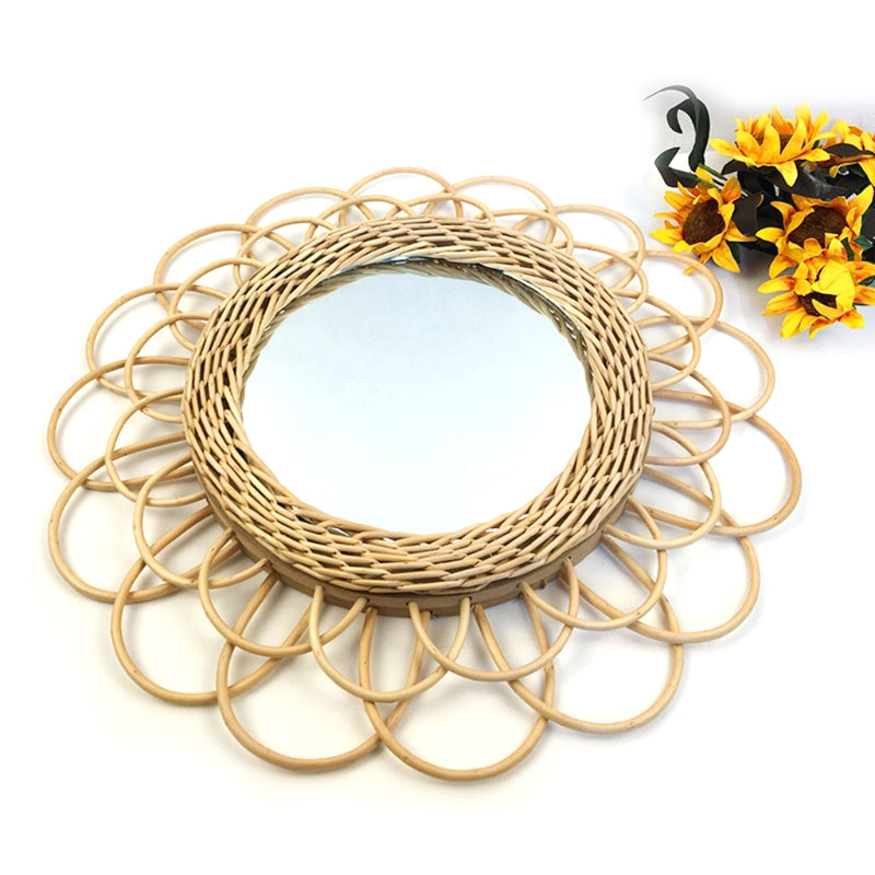 Scalloped rattan petals around a woven ring.