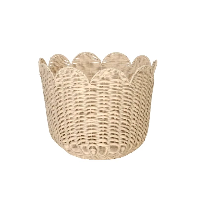Beige handwoven rattan basket with a scalloped edge